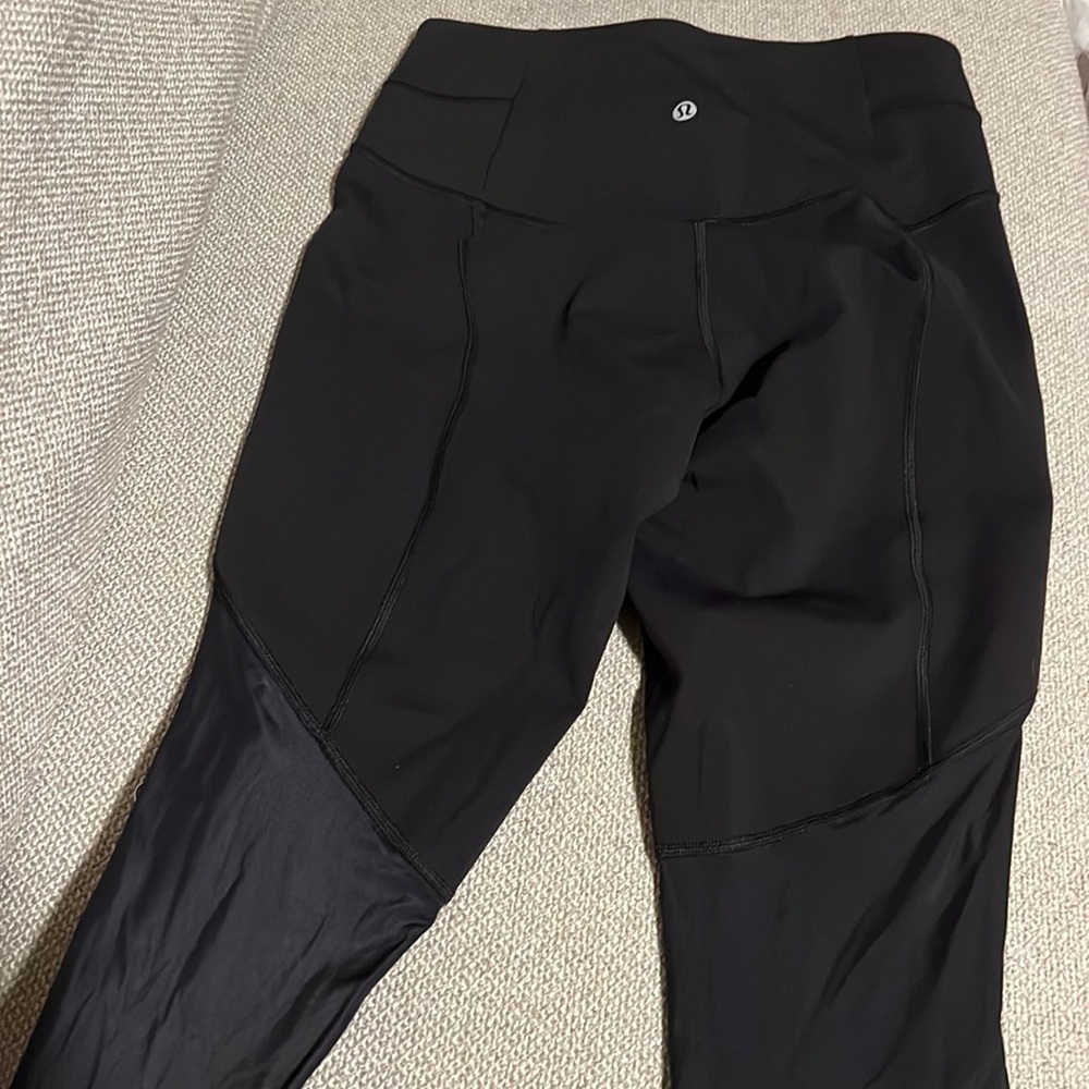 Lululemon black leggings size 4